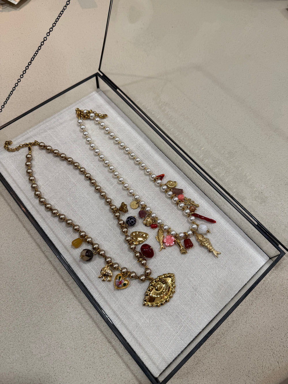 Collier pearl oeil et poisson